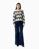 Oui long flared jeans for women in soft stretch cotton blend paired with white sweater
