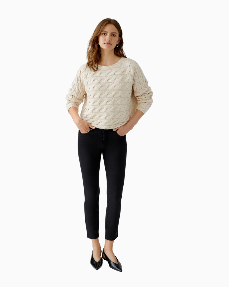 Oui jumper styled with high-waisted trousers