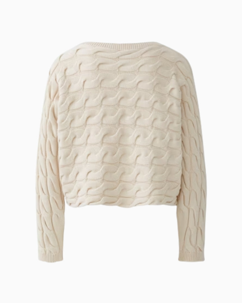 Back view showing full cable knit texture