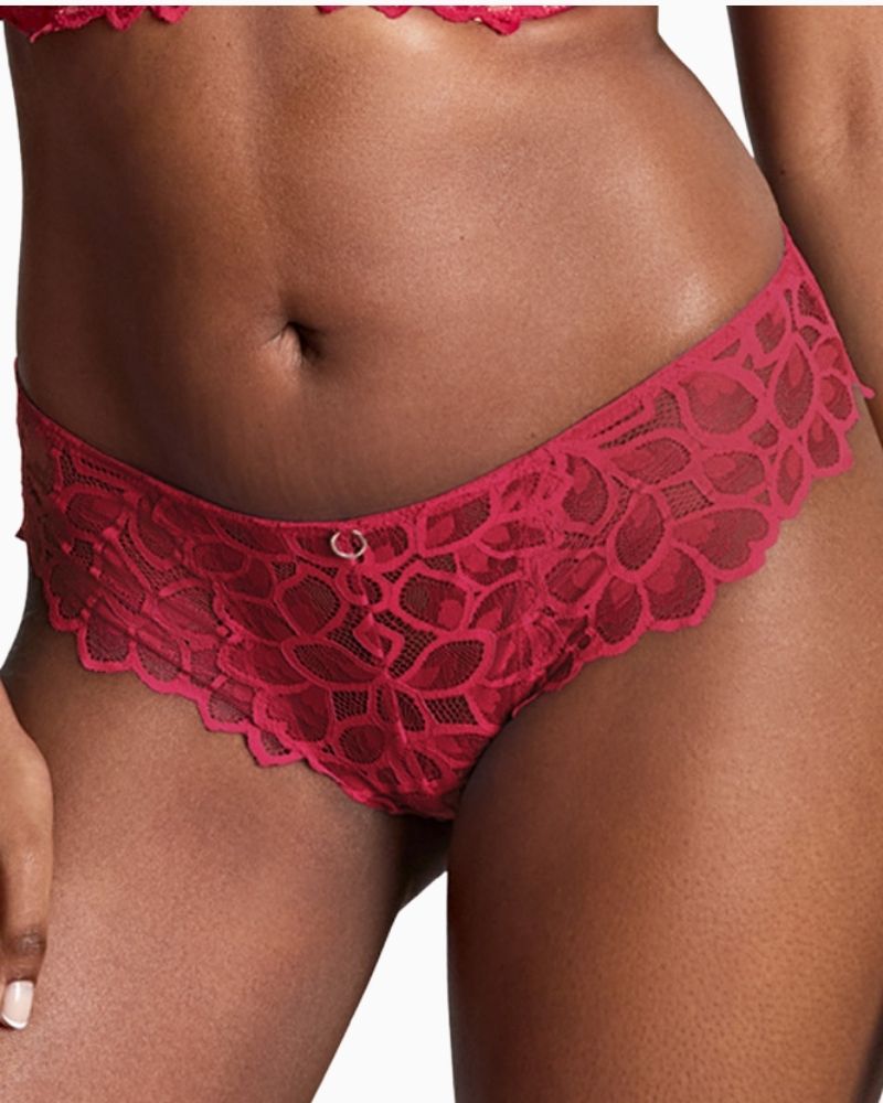 Close-up view Panache Allure Brazilian Brief in raspberry lace with keyhole detail and gold ring