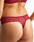 Close-up of Panache Envy lace with metallic shimmer in cherry red