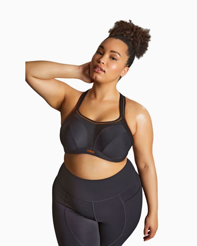 Sculptresse Activate sports bra in black with high neckline and wide padded straps