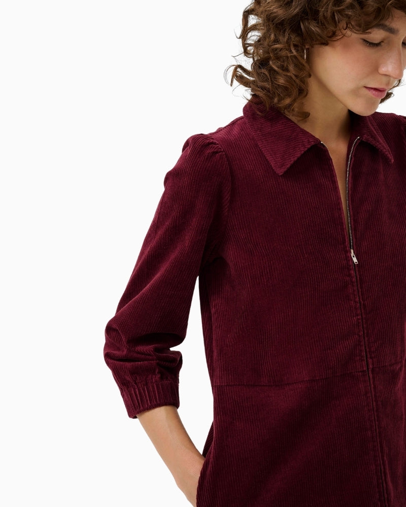 Close-up of soft cord fabric and 3/4 sleeve with elastic cuff on Eyvor dress