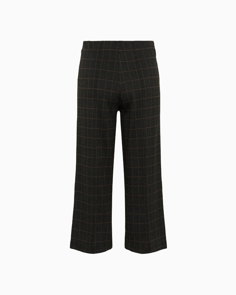 Back view of Ilisan trousers showing relaxed fit and high waist