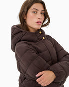 Close-up of snap-button front and soft quilted texture on LaineyPW winter coat