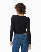 Back view of long sleeve slim tee with soft drape and stretch fabric