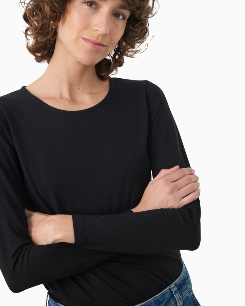 Close‑up fabric texture of Nemaja tee blending organic cotton and TENCEL™ Modal