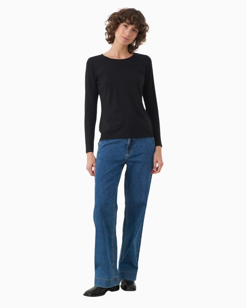 Tee laid flat showing full sleeve length and slim fit design