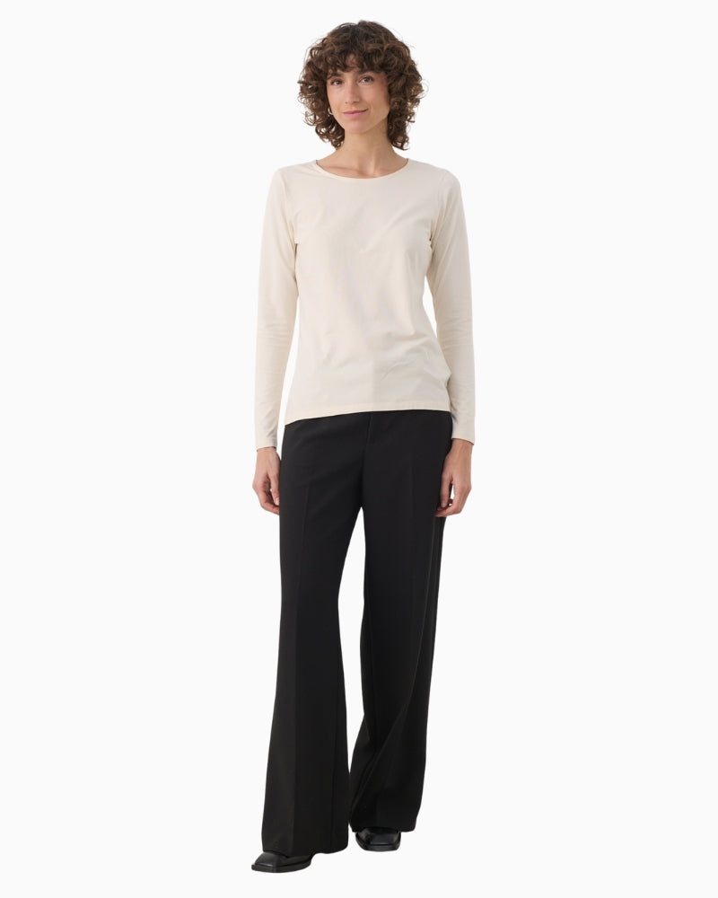 Tee laid flat showing Modal blend texture and slim shape