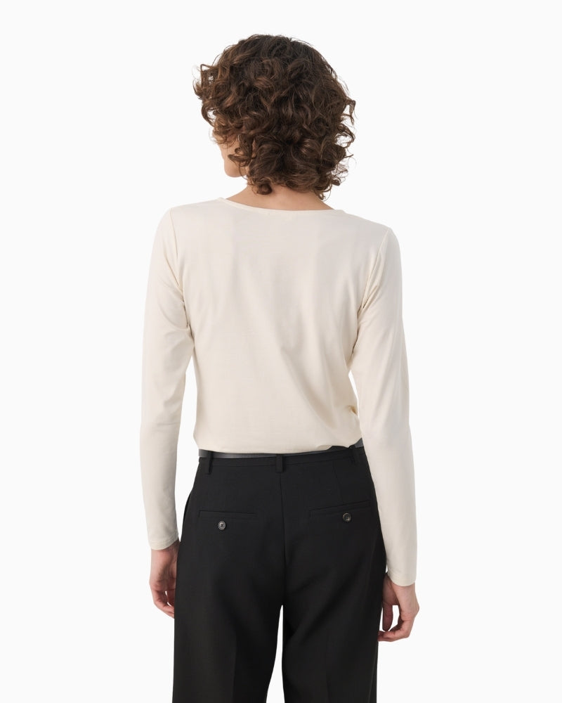 Back view of tee by Part Two showing length and fit on model