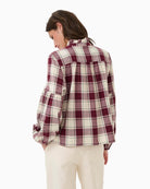 Back view of relaxed check blouse with feminine detailing and clean shape