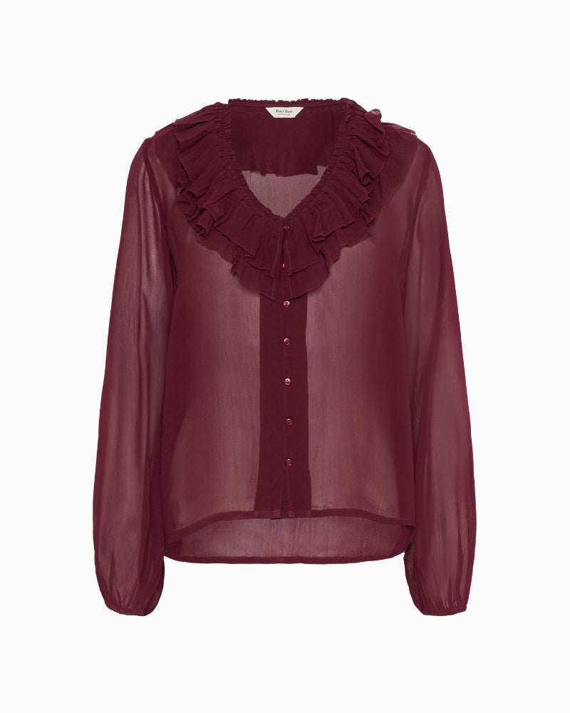 Front view of burgundy sheer blouse by Part Two with ruffled neckline and button front