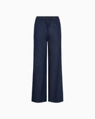 Back view of Sarana trousers showing comfort waistband and full-length cut