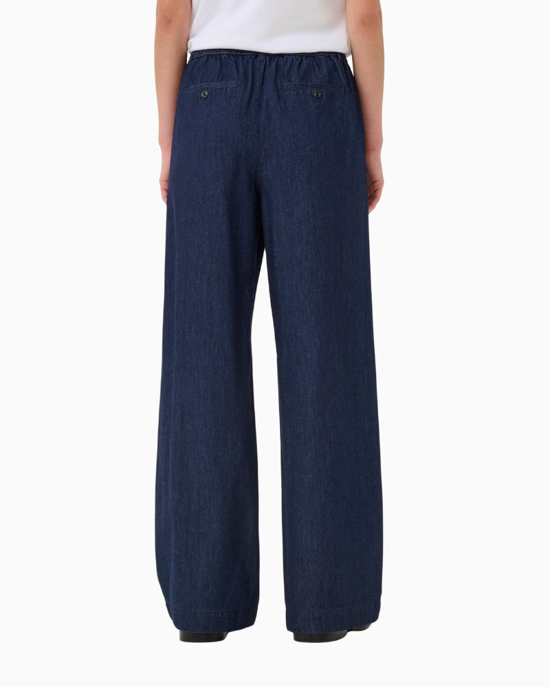 Back view of Sarana trousers showing comfort waistband and full-length cut