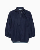 Front view Dark rinse denim blouse by Part Two with necktie and ¾ gathered sleeves