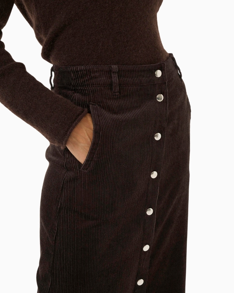 Close-up of corduroy fabric and front buttons on Shayla skirt