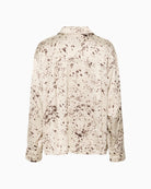 Back view of relaxed fit blouse showing long sleeves and soft drape