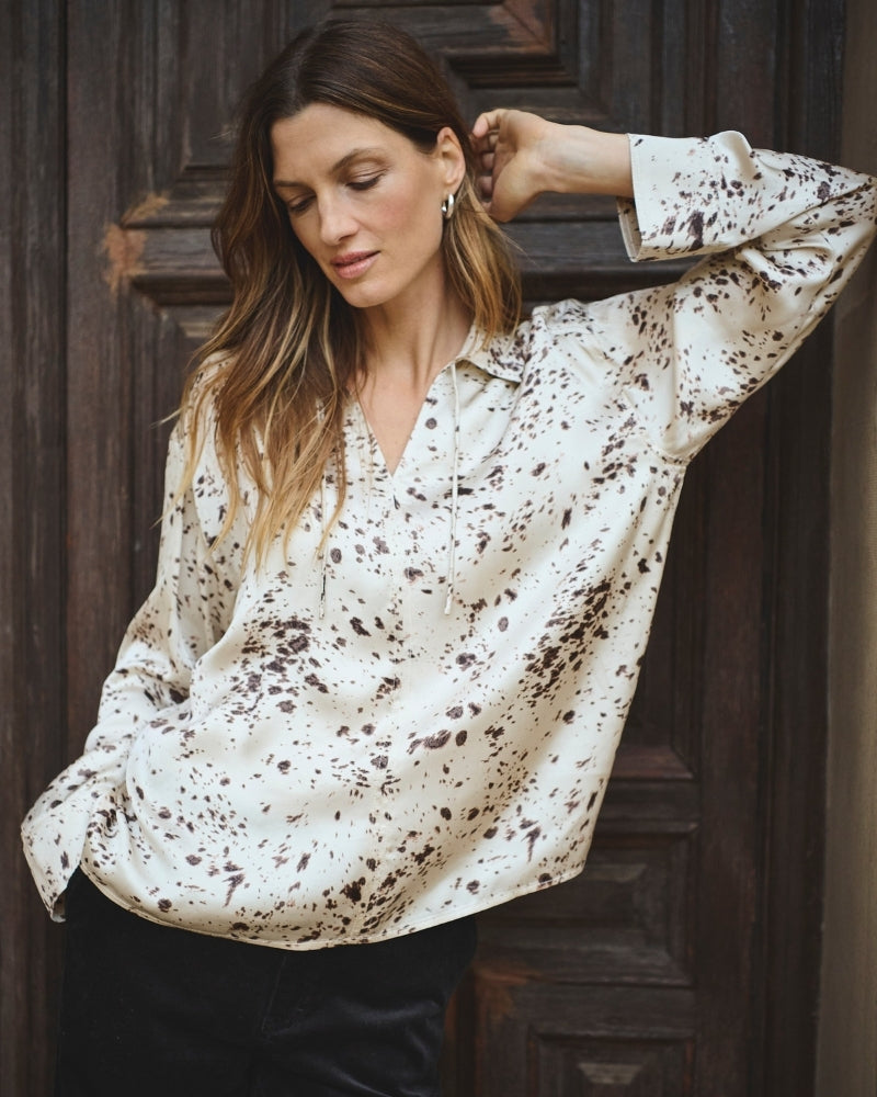 Full-length look of model wearing oversized printed blouse by Part Two in size 36