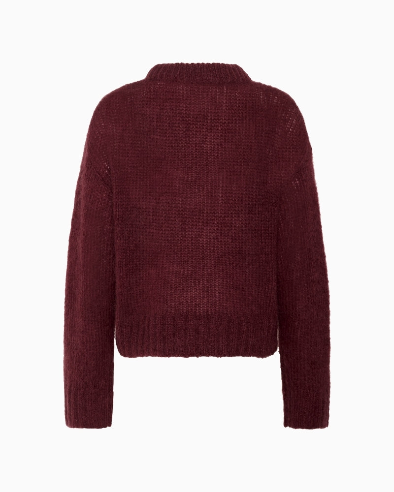 Back view of Sille pullover in burgundy with long sleeves and relaxed shape