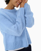 Close-up of soft knit texture and wide ribbed cuff on Sille pullover