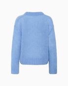 Back view of relaxed fit blue jumper with long sleeves and airy finish