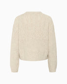 Back of warm wool jumper with easy fit and mixed knit pattern