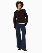 Model wearing Sindy wool knit by Part Two with relaxed fit and long sleeves