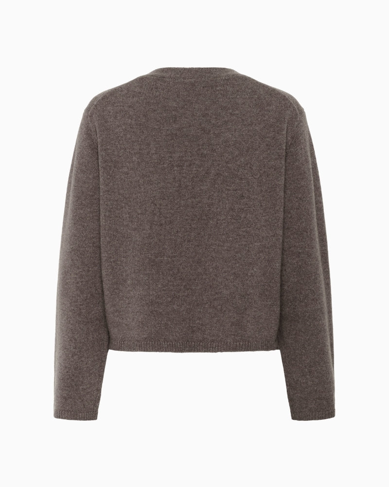 SvevaPW cardigan layered over dress, showcasing casual, cosy styling