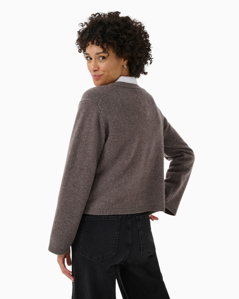 Back of SvevaPW cardigan layered over dress, showcasing casual, cosy styling