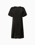 Back view of Ulva dress in black with minimal seam detail
