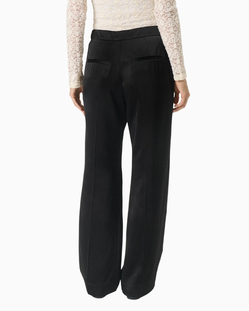 Back view of classic fit black trousers with structured shape