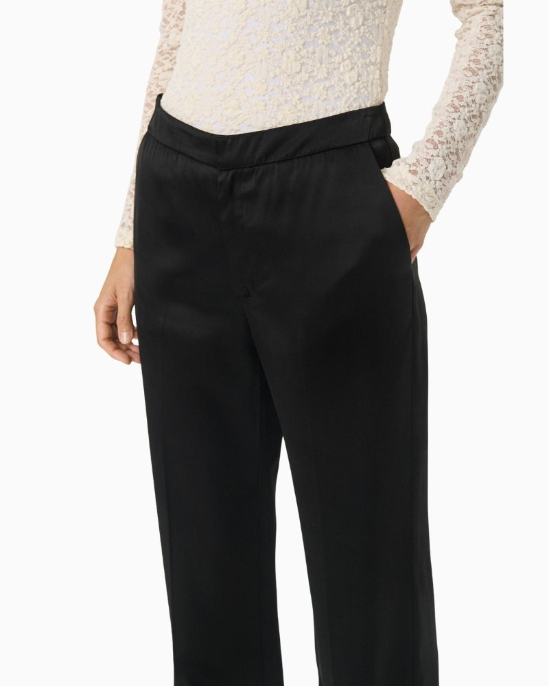 Close-up of waistband and clean seam finish on Uma trousers