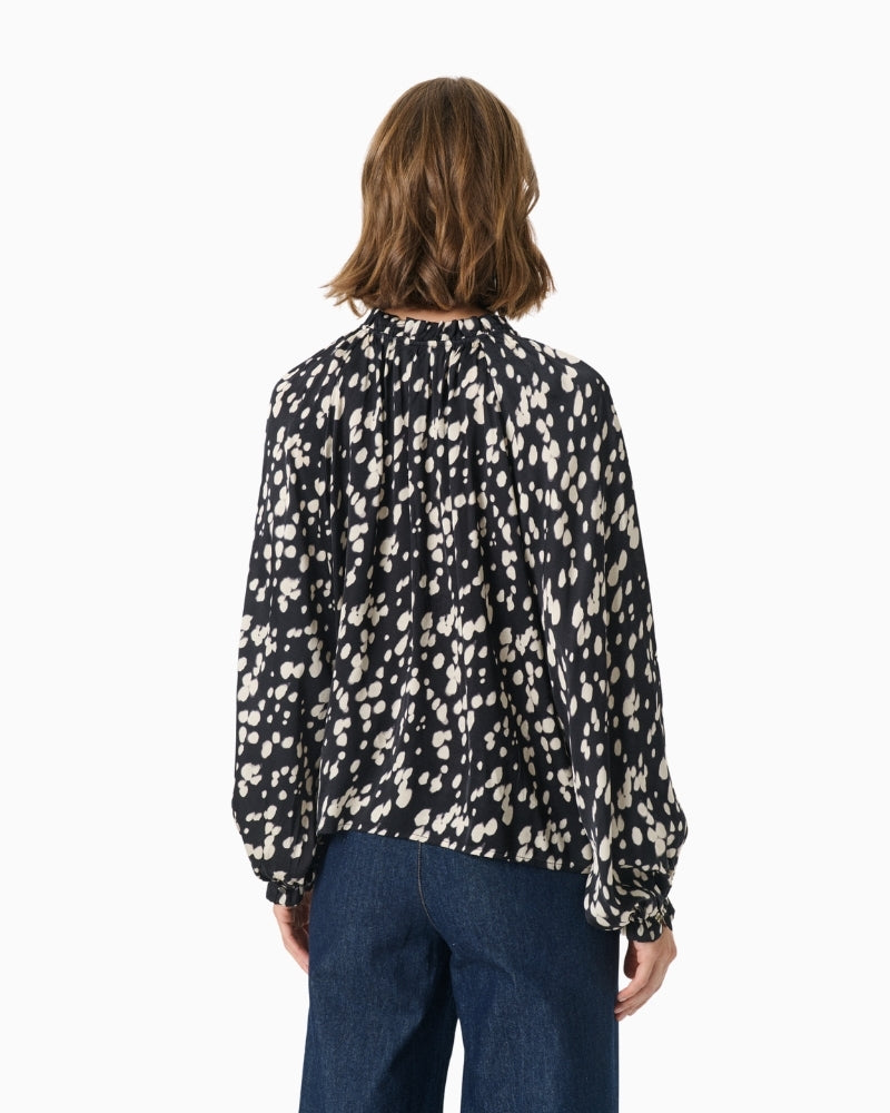 Back view of Part Two shirt with clean tailoring and smooth finish