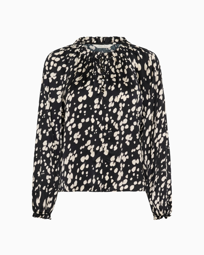 Front view of grey blouse with buttoned cuff and soft drape