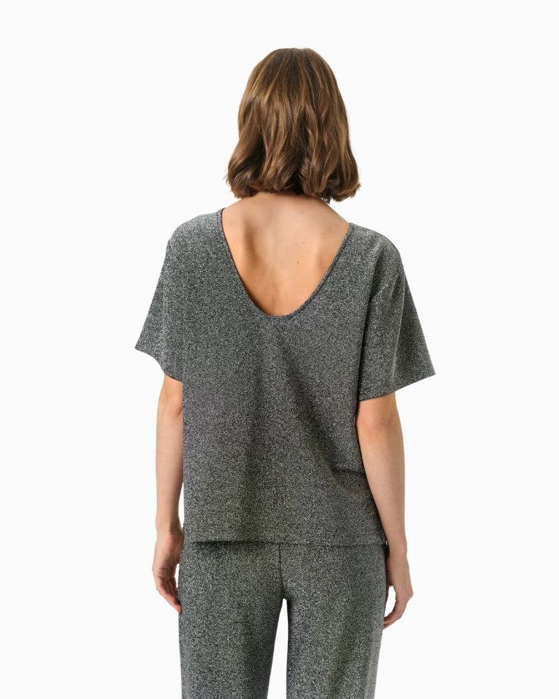 Back view of Part Two shimmer top with clean, draped finish