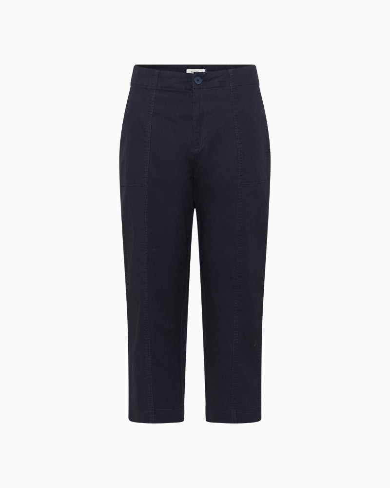 Front view of navy ankle-length trousers on model, regular waist