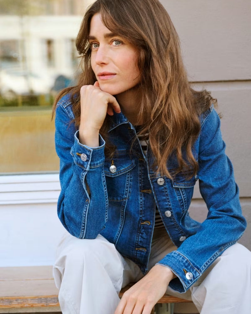 Part Two NicholiaPW Denim Jacket in blue denim sitting model view