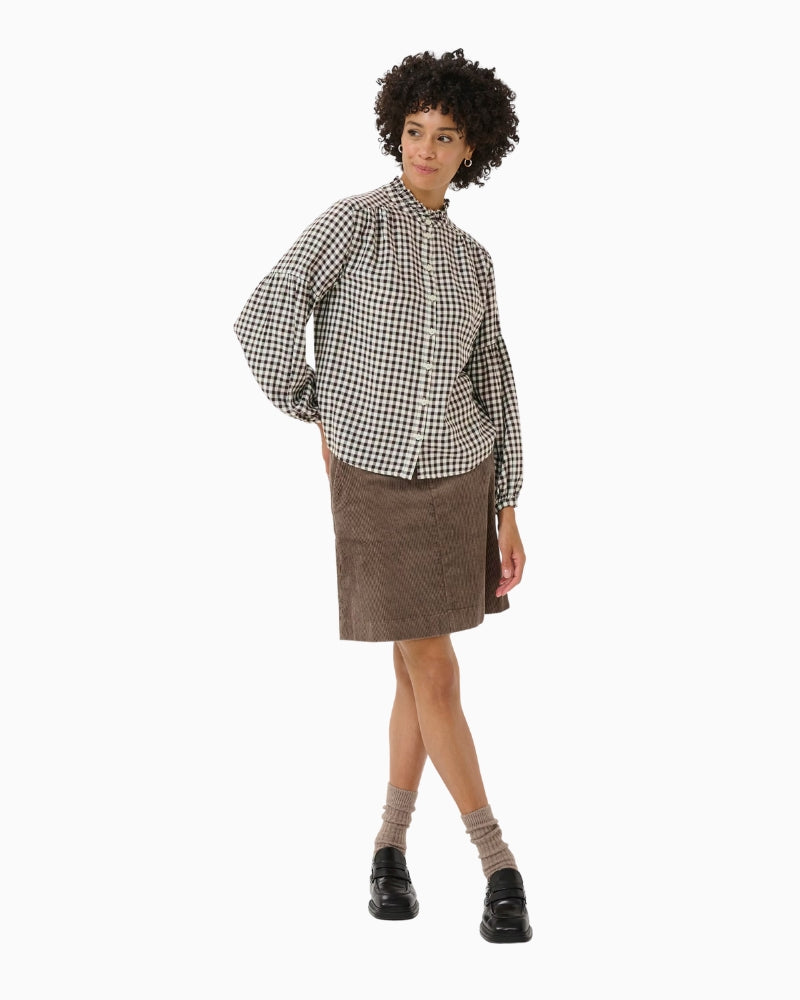 Model wearing Part Two Samilla shirt paired with brown skirt for a casual look