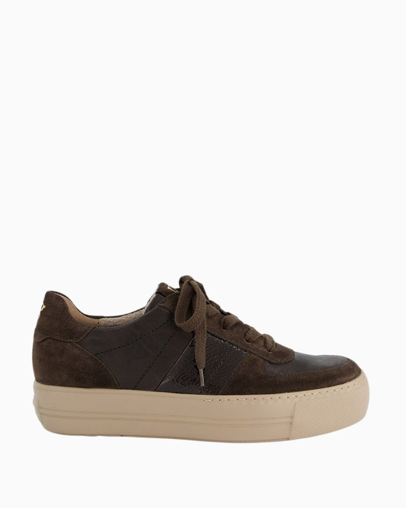 Side view of brown platform sneakers with mixed leather finish