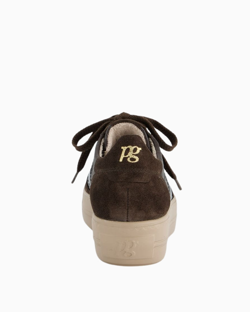 Close-up of crumpled-look patent leather detail on sneakers