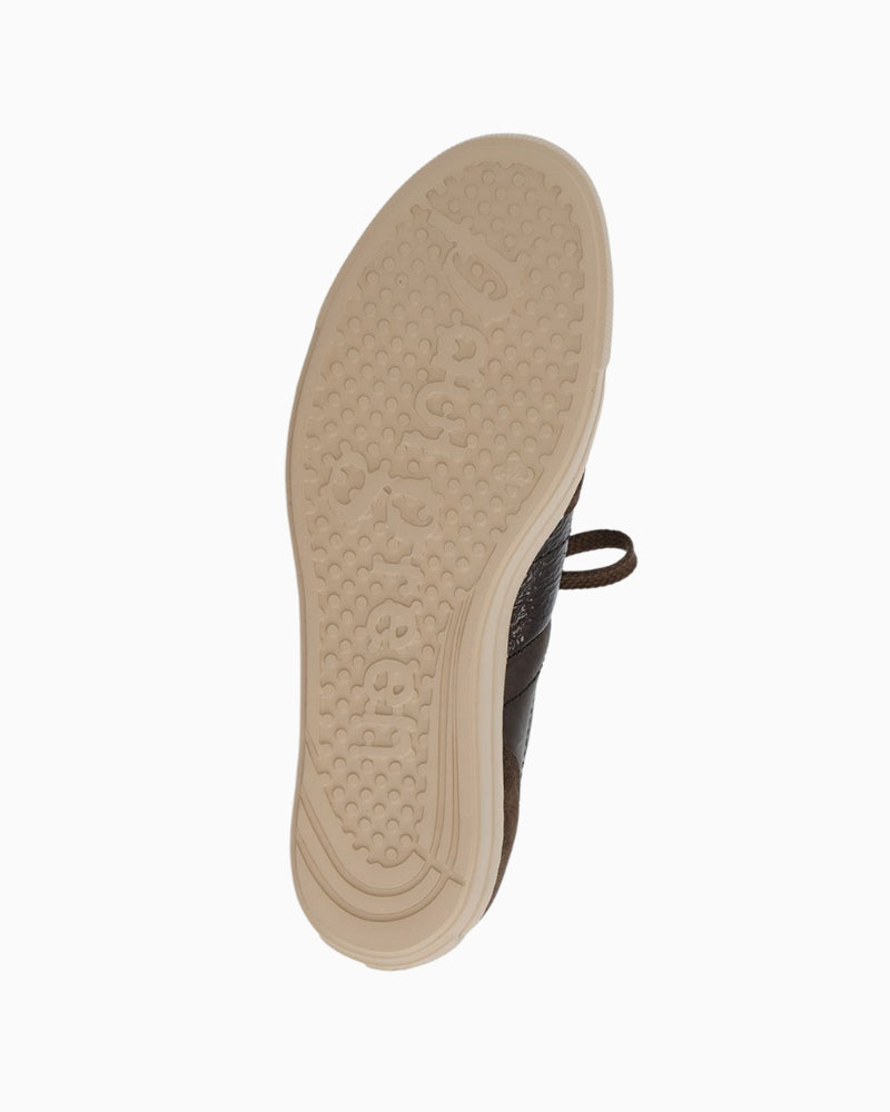 Back view of brown leather sneakers with entry loop