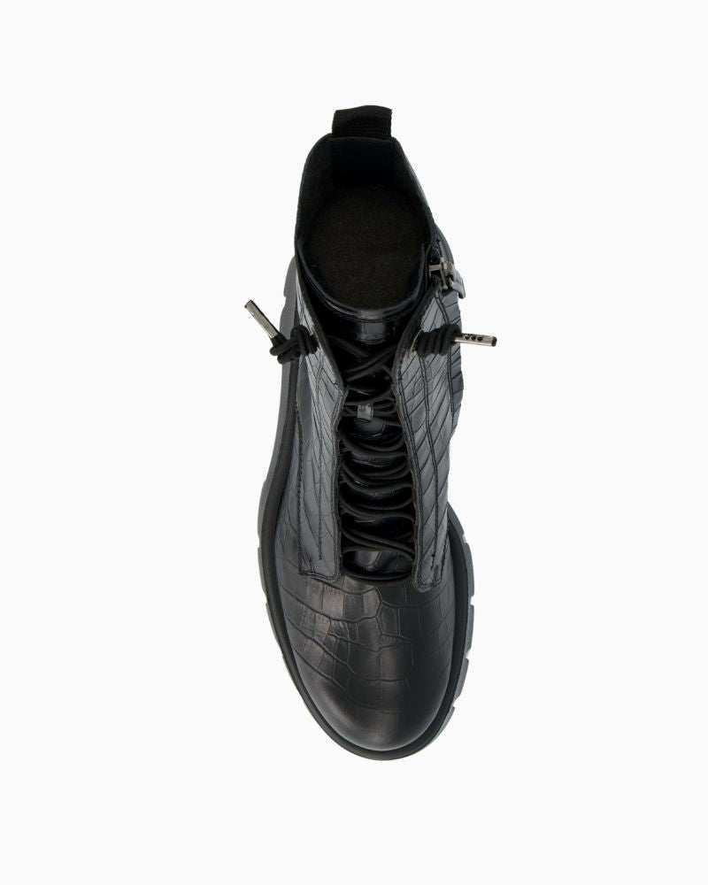 Upper view of lace-up boots showing clean silhouette and lightweight EVA sole