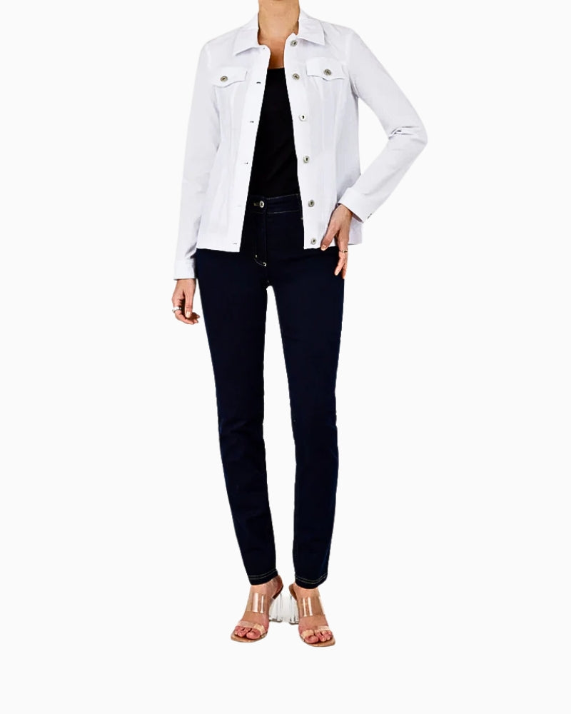 Model styling Robell white denim jacket with black top and navy trousers
