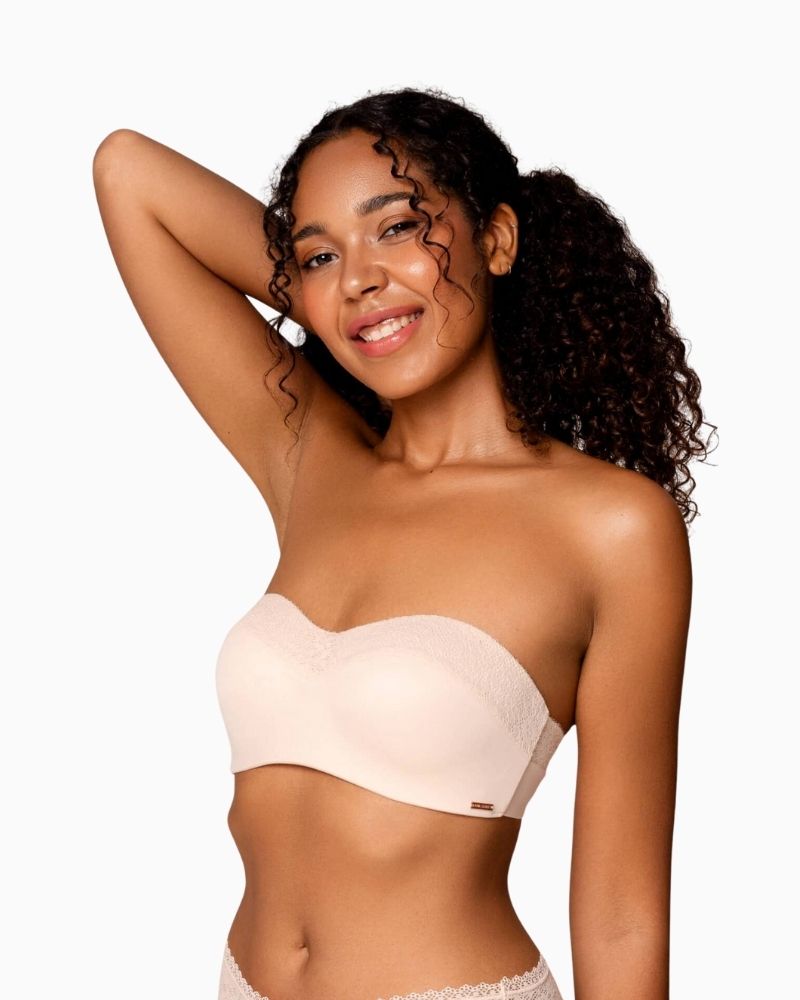 Side view of Strapless nude bra by Royal Lounge with lace detail and seamless cups