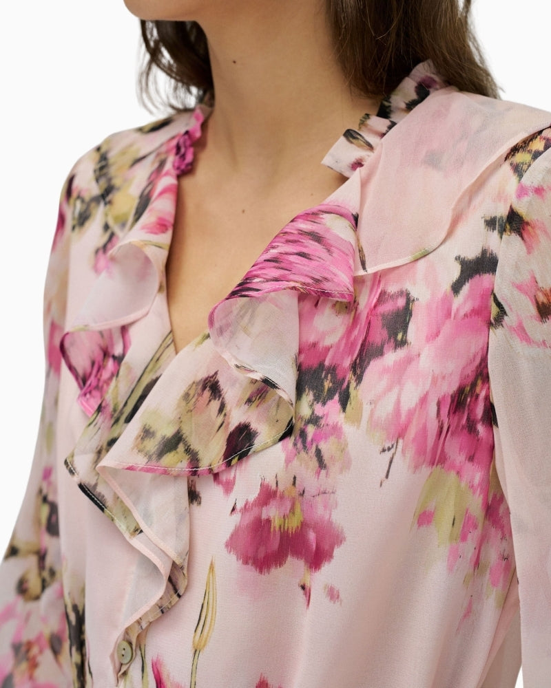 Close-up of Salsa floral dress pink V-neck ruffle detail – Áines Boutique