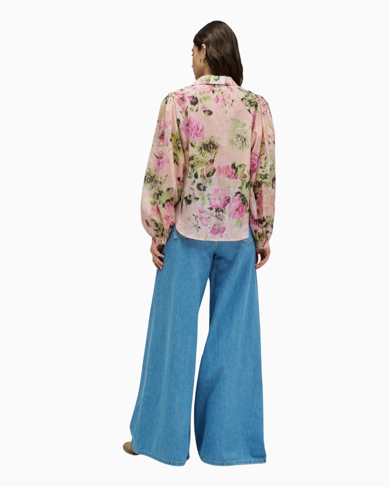 Woman wearing Salsa floral cotton blouse, back view – Áines Boutique
