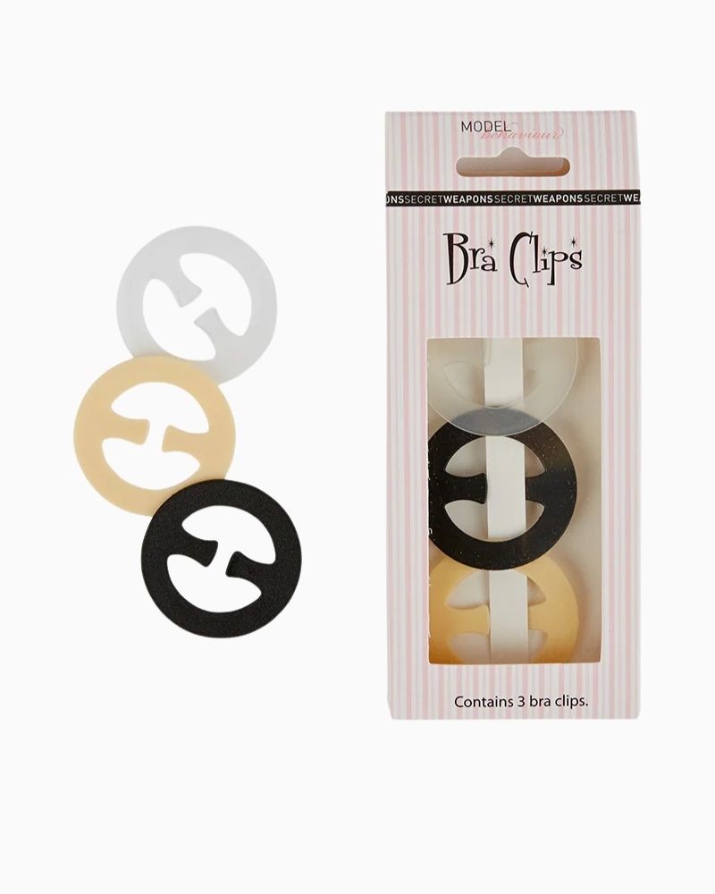 Close-up of clear bra clip in use, pulling straps together for racerback fit