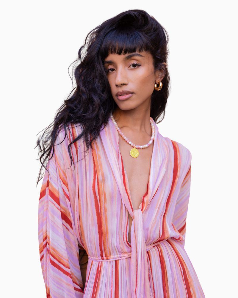 Pair of large donut hoop earrings with linen drawstring pouch