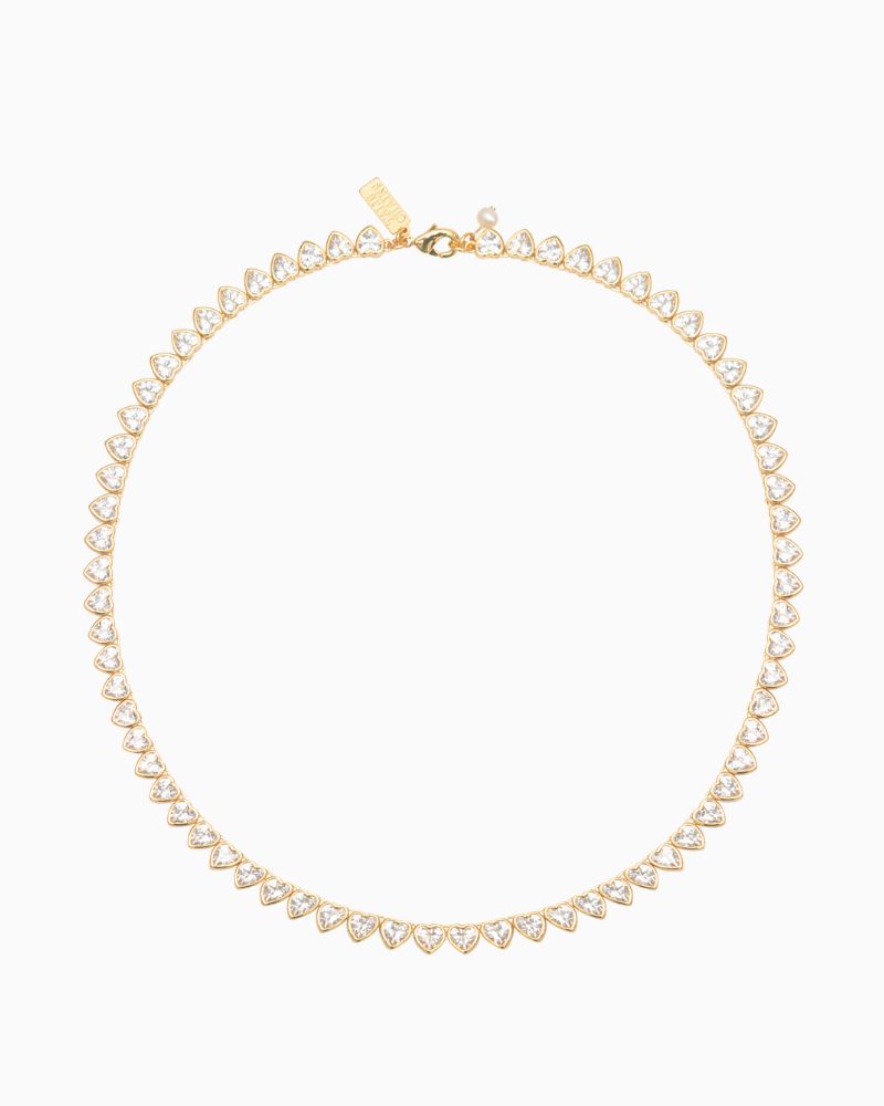 Gold plated hearts tennis necklace shown with linen drawstring pouch