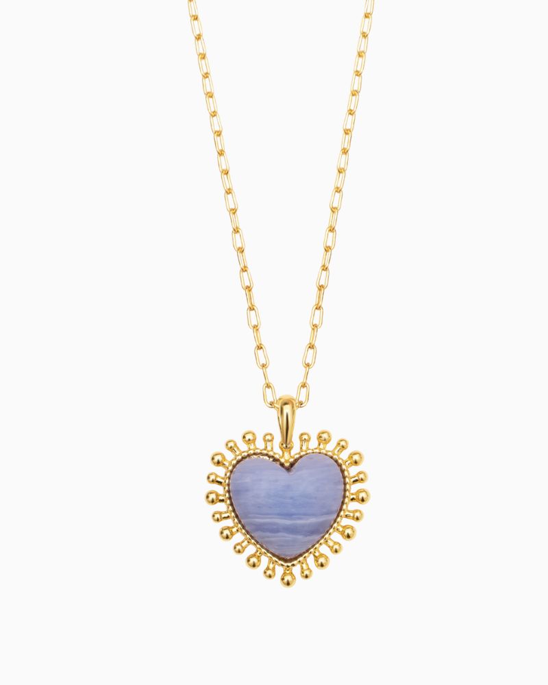 Close-up of hand-cut Blue Lace stone heart pendant with freshwater pearl detail